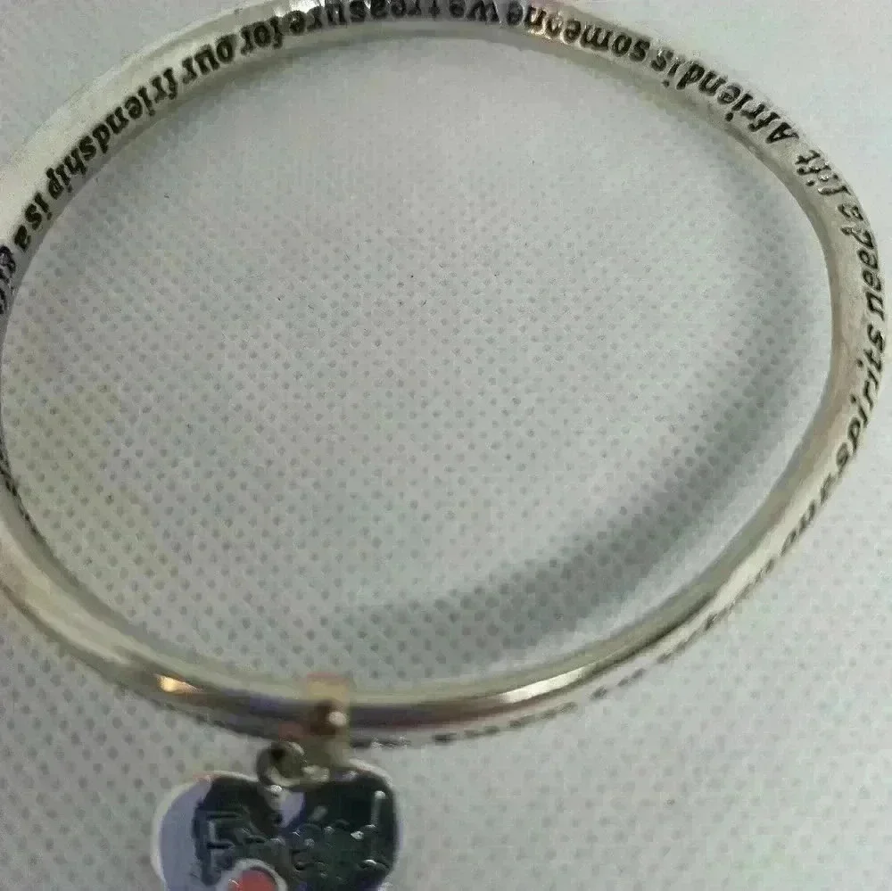 Sliver tone friend heart bangle